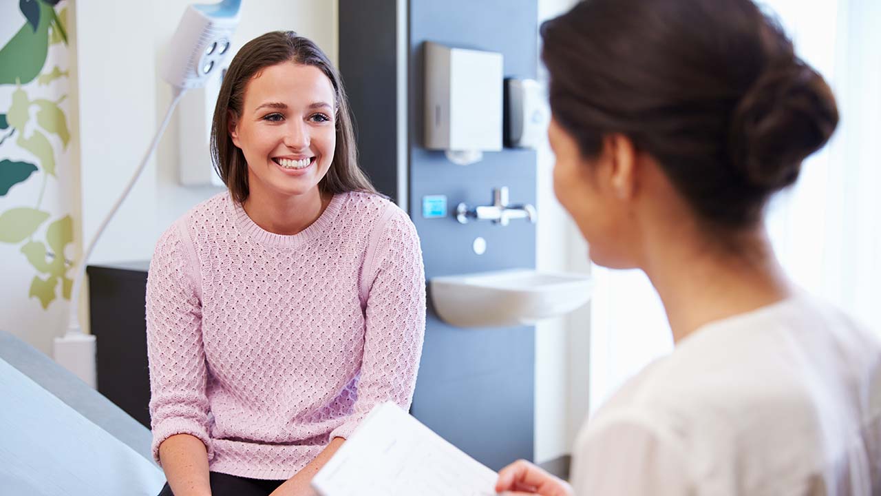 patient and doctor discussing the weight loss program